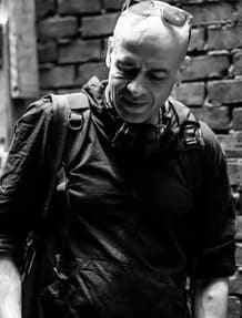 Portrait of Medhat Soody in front of a brick wall